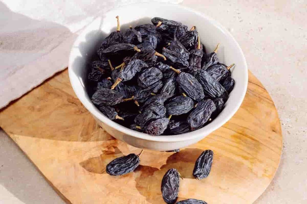 Different variety of black raisins in bulk